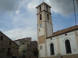 Torre-campanario de la iglesia parroquial de Tírig